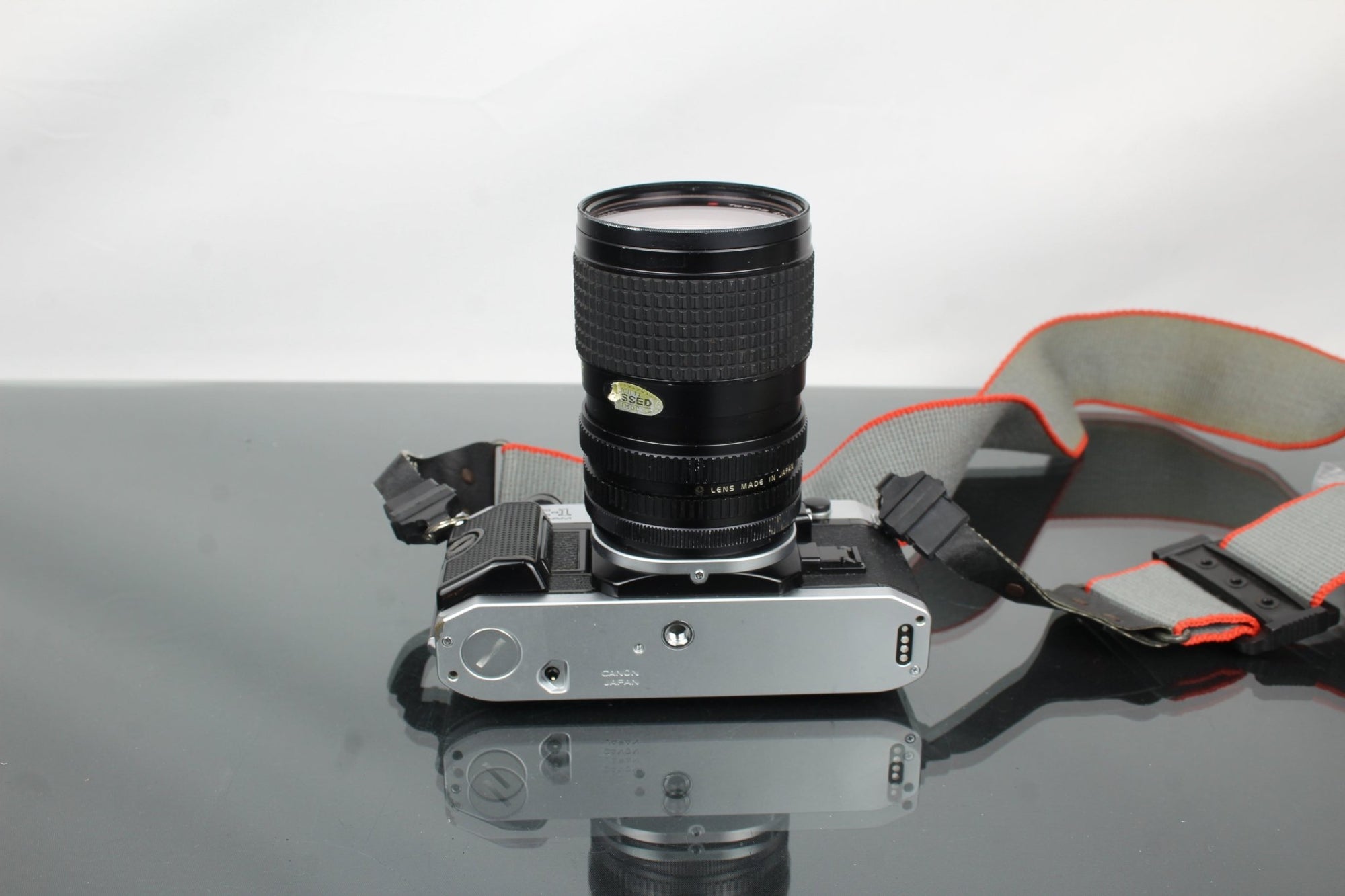 Canon AE - 1 Program + Tokina AT - X 28 - 85mm Canon FD mount lens - Dutch|Thrift