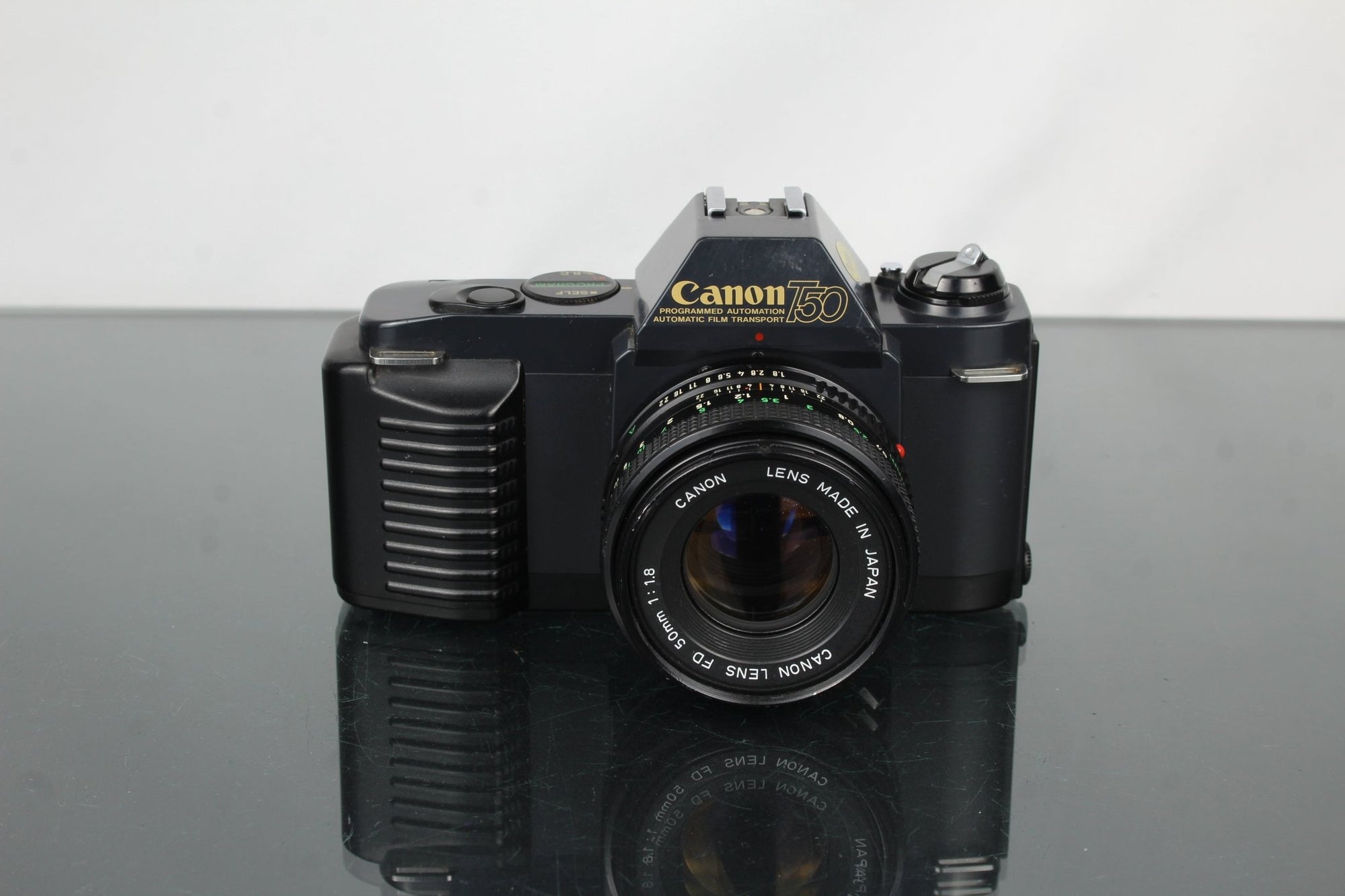 Canon T50 + 50mm 1.8 Canon FD lens - Dutch|Thrift
